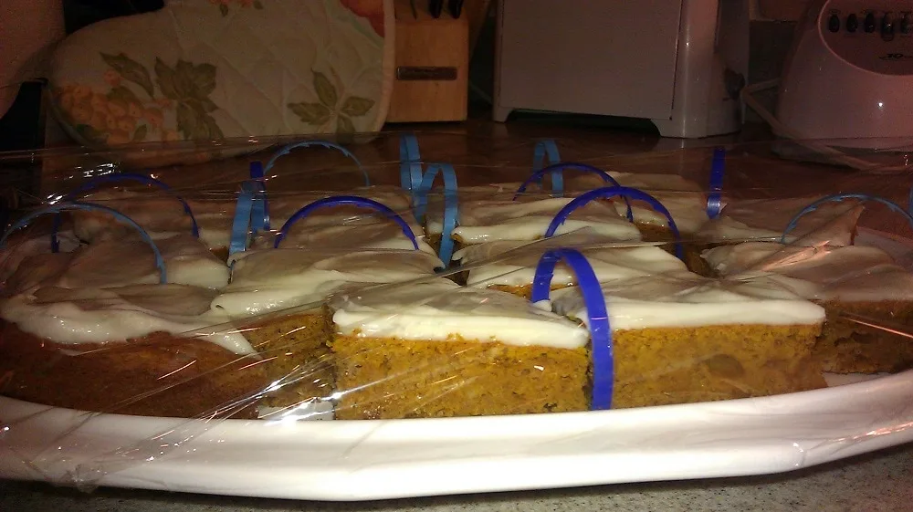 Milk rings between cake slices to tent saran wrap for transported baked goods without smooshing the frosting. 