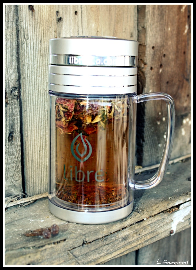 Libre tea mug with loose leaf tea in it. 