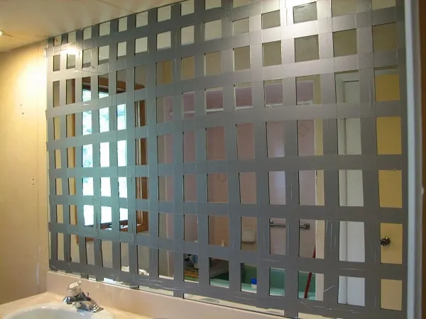 duct tape grid on mirror