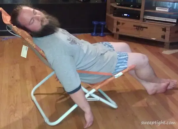 Ben sleeping in a beach chair. 