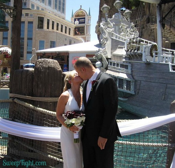 Jen and Mike getting married on the pirate ship in Las Vegas. 