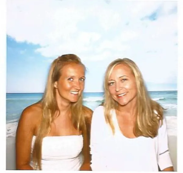 Shelley Van and Jen Soltys in a beach photo booth. 