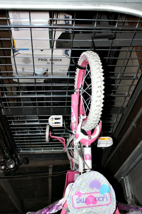 A bike hanging from SafeRacks in the garage. 