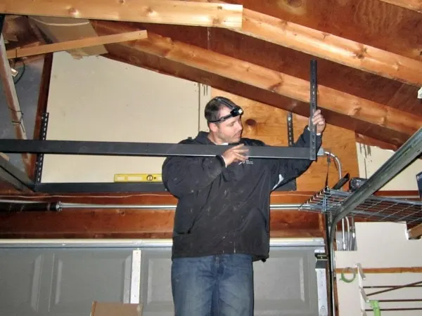 Mike installing SafeRacks in our garage. 