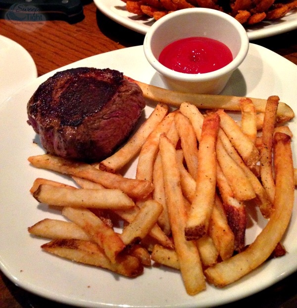 Steak and fries at Outback Steakhouse.