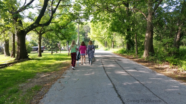 Friends walking down the street. 