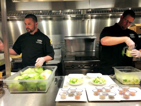 Chefs at Outback Steakhouse making salads. 