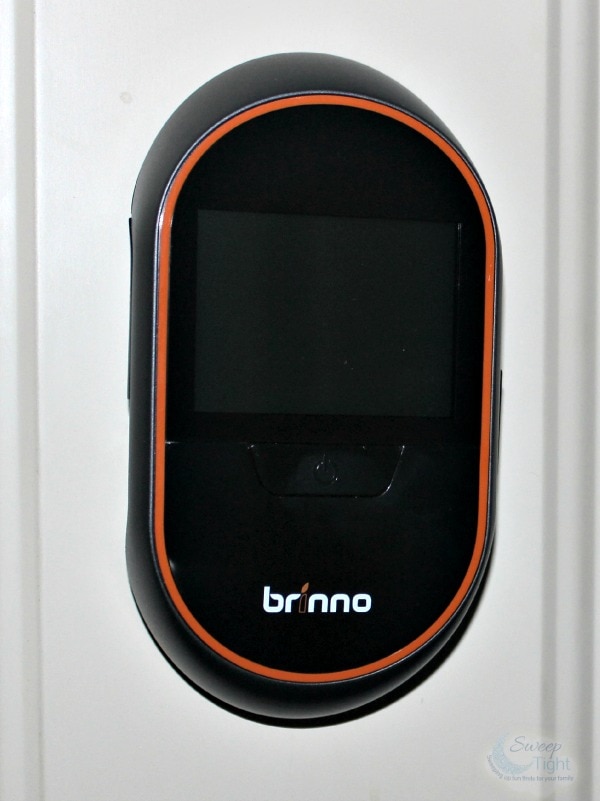 Brinno PeepHole Camera on the inside of the door. 