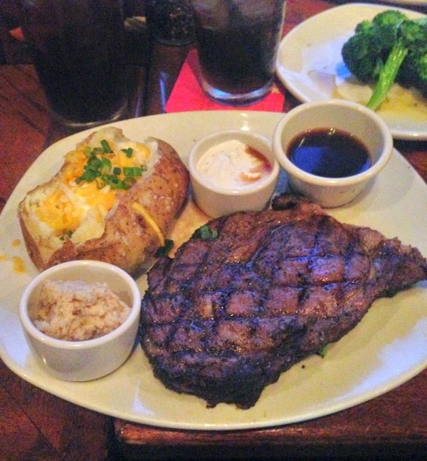 Steak and baked potato at Outback Steakhouse. 