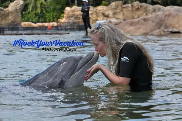 Dolphin kisses at Discovery Cove Orlando #RockYourVacation