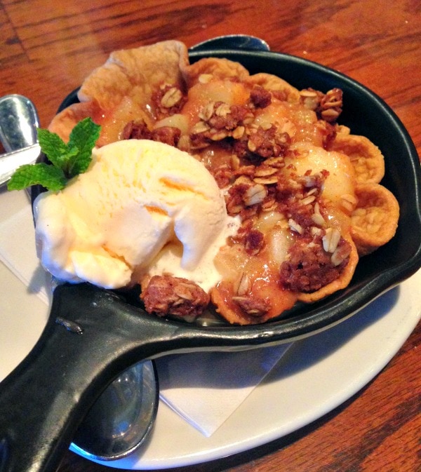 Skillet Apple Pie topped with ice cream from Outback. 