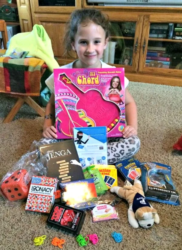 Mia with Chicago Toy and Game Fair Goodies.