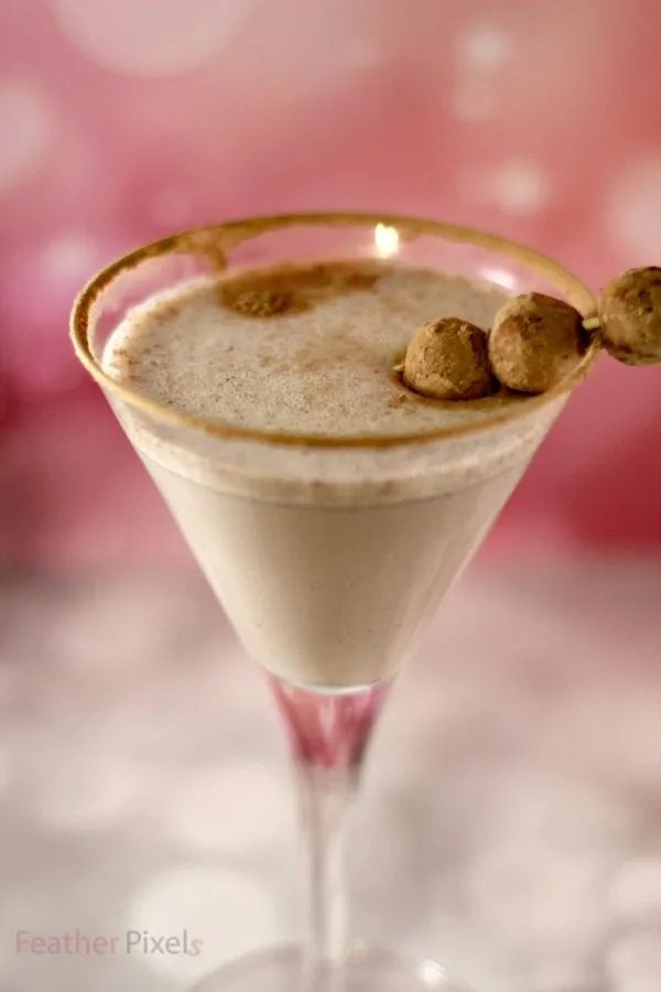 Snickerdoodle mixed drink in a martini glass.
