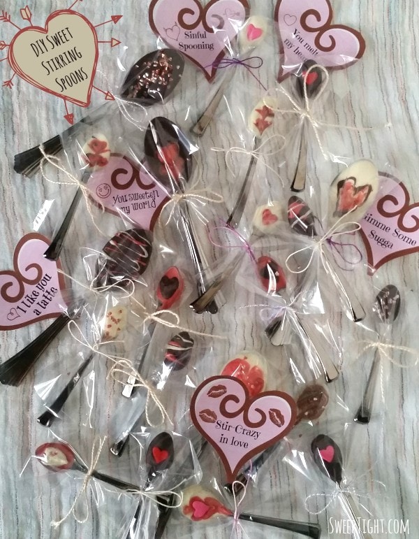 Several decorated stirring spoons with different tags for Valentine's day
