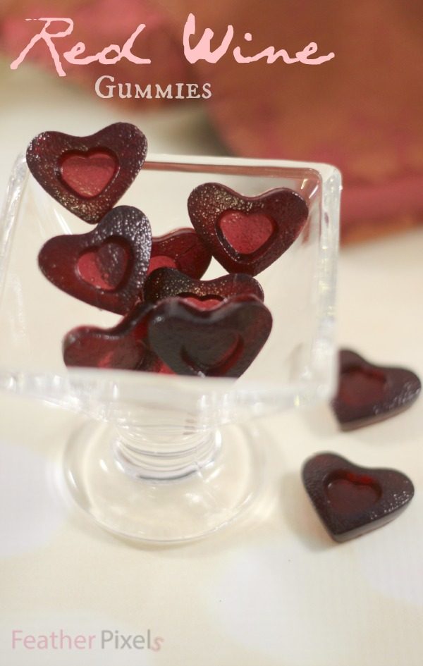 Red wine heart gummies in a dish