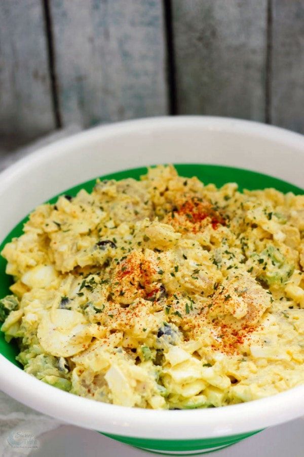 Potato salad in a green container. 