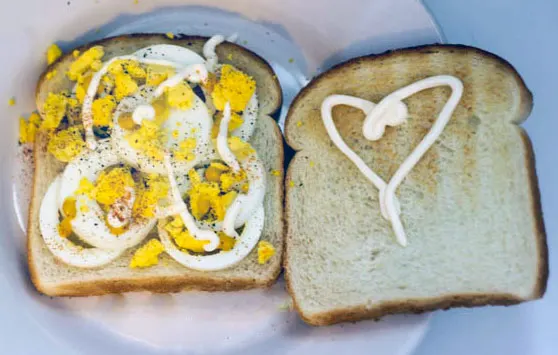 Hard boiled egg on toast for a sandwich. 