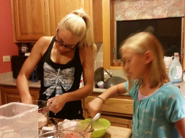 Bikini fitness competitor baking with my daughter. So cute. Awesome role model. Beauty supply