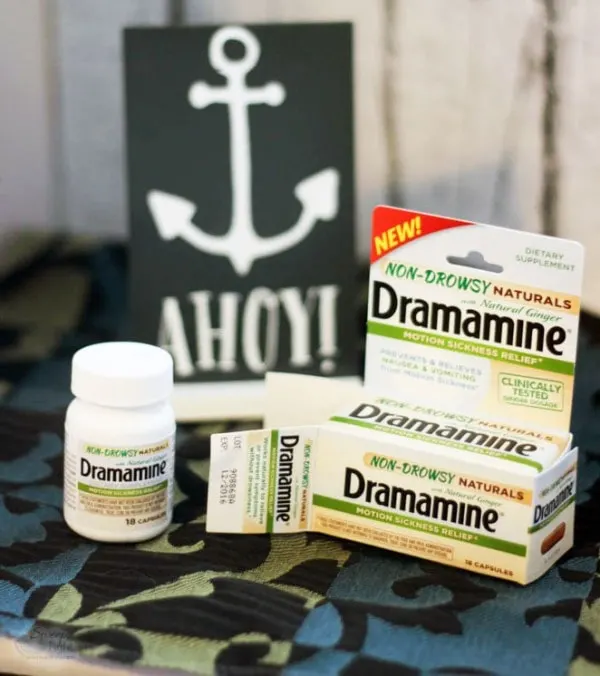 Dramamine motion sickness bottle next to the box and a sign that says "ahoy!"