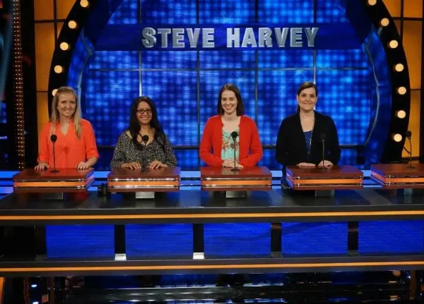 Four bloggers on the set of Family Feud. 