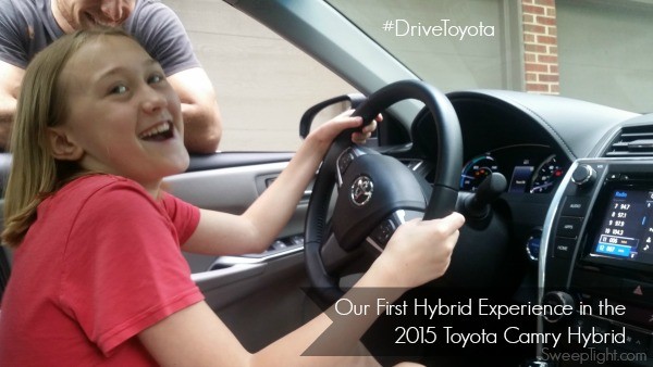 Chesney behind the wheel of the 2015 Toyota Camry Hybrid. 
