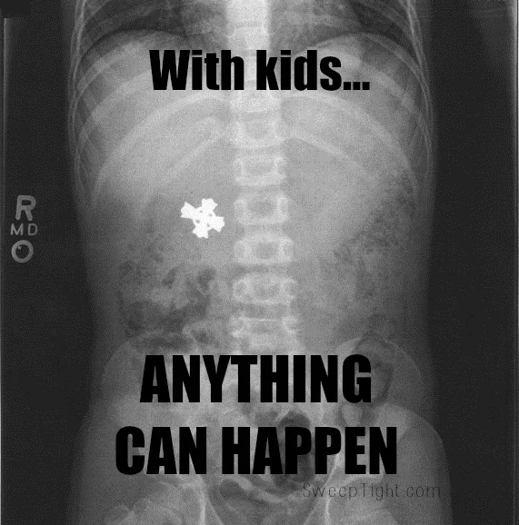 Xray with a piece of jewelry inside the body. 