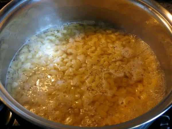 Bowl of macaroni in a pot. 