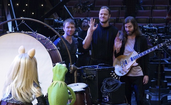 Imagine Dragons performs their new single "Roots," on the season premiere of "The Muppets," (ABC/Eric McCandless) MISS PIGGY, KERMIT THE FROG, IMAGINE DRAGONS