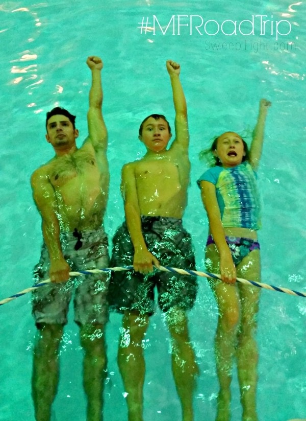 Silly family in the spring fed indoor pool at Omni Bedford Springs Resort in the Allegheny Mountains #MFRoadTrip