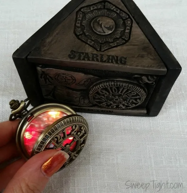 A glowing Starling Steampunk Pocket Watch.