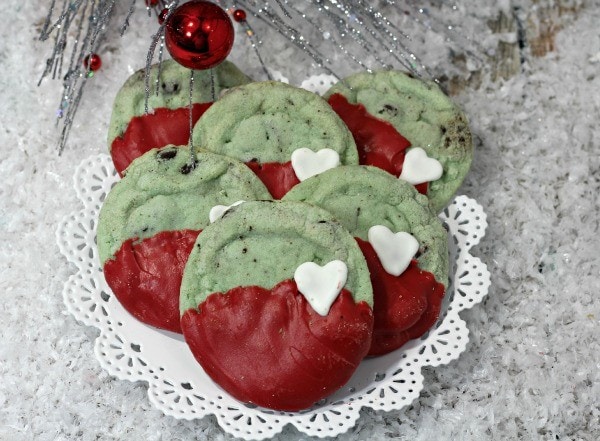 Mint chip cookies decorated to look Grinch-inspired for Christmas. 