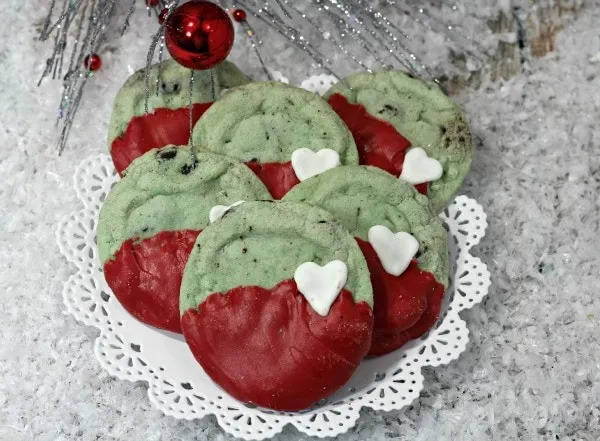 Mint chip cookies decorated to look Grinch-inspired for Christmas. 