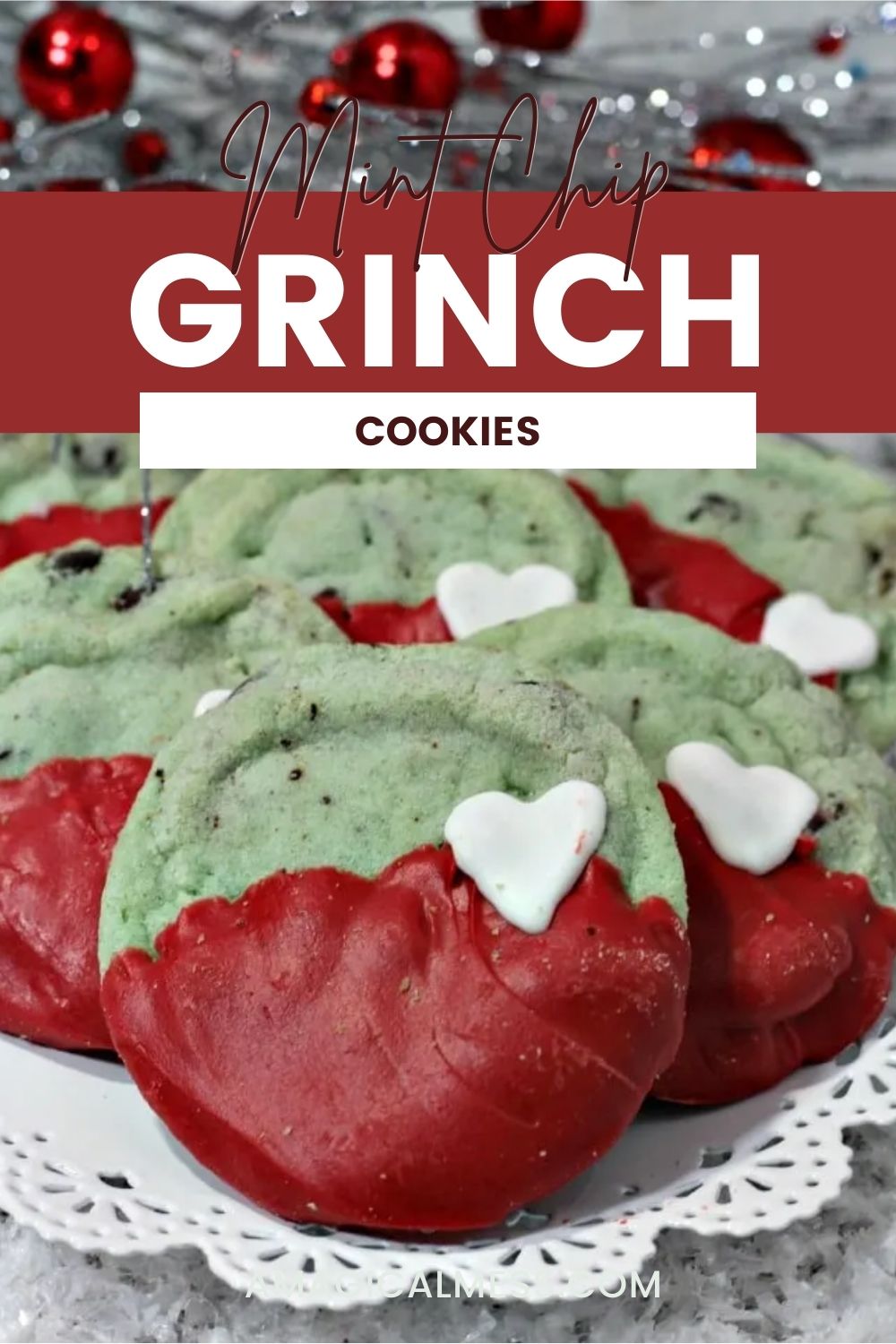 Mint chip Grinch cookies on a plate under a silver tree. 