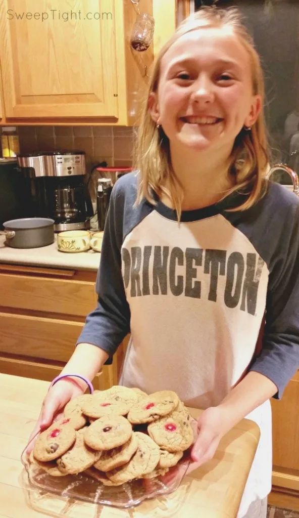 Chesney holding cookies. 