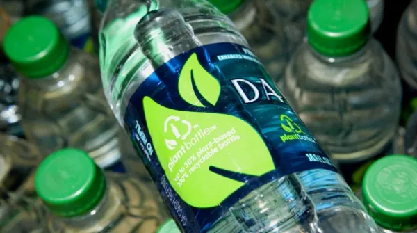 Dasani green cap bottle made with plant materials. Eco friendly water bottle choice.