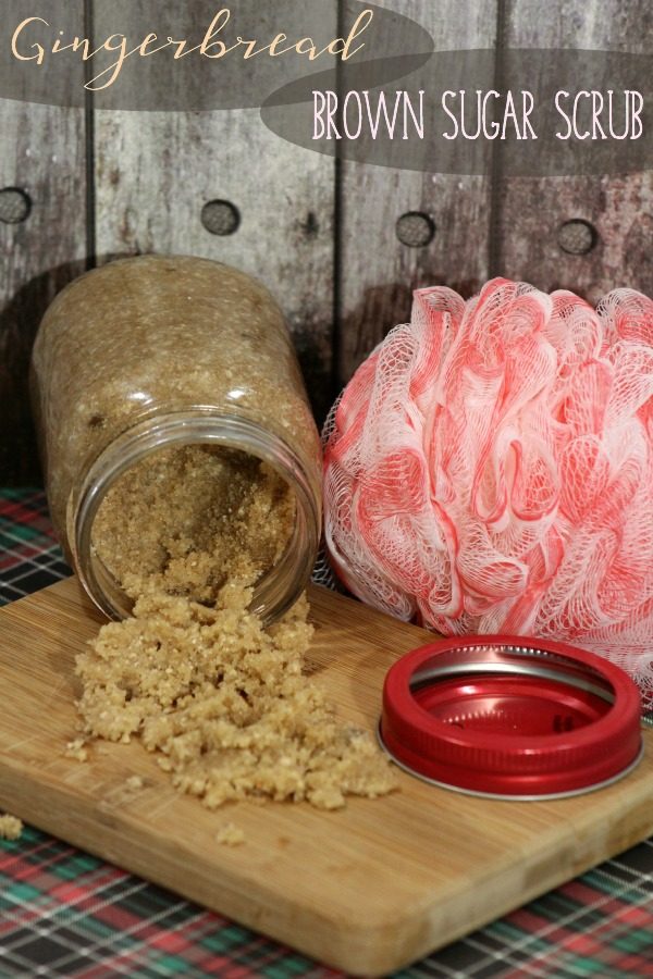 A jar of gingerbread brown sugar scrub dumped out next to a loofah. 