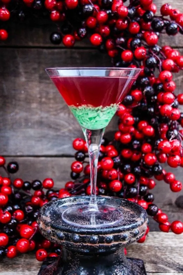 Crushed peppermint martini with layered red and green colors. 