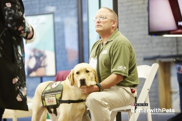 Soldier Kent Phyfe and his service dog, Mike.