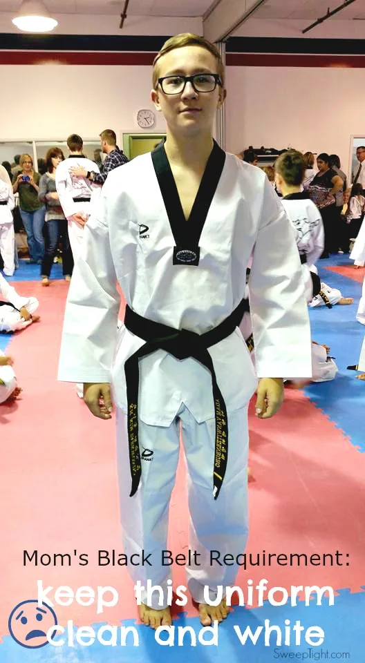 Adam in his taekwondo uniform and mom's challenge to keep it clean and white. 