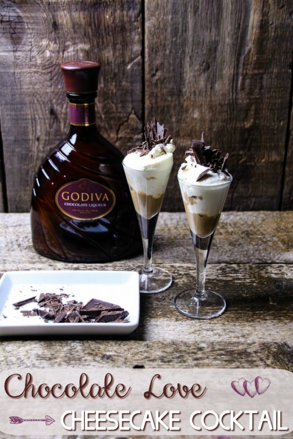 Two glasses of cheesecake cocktail next to Godiva Liqueur and chocolate pieces. 