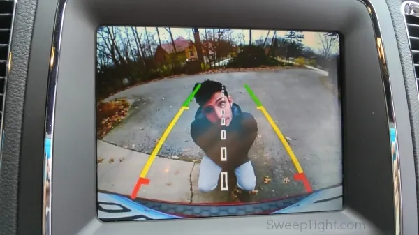 Evan in the reverse camera of the Durango. 