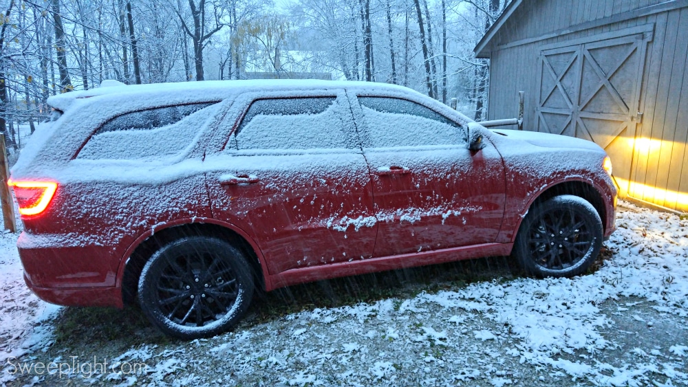 2015 Dodge Durango covered in snow. 