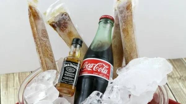 Bottle of Jack, bottle of Coke, and frozen pops of Jack and Coke.