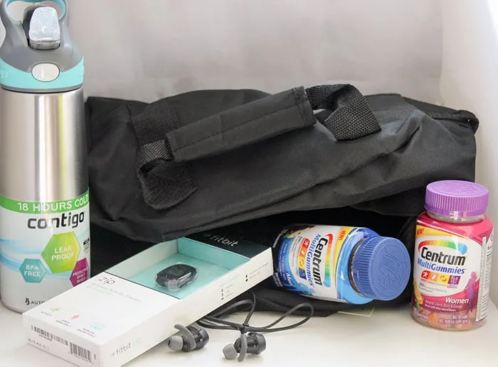 Gym bag stocked with healthy motivators