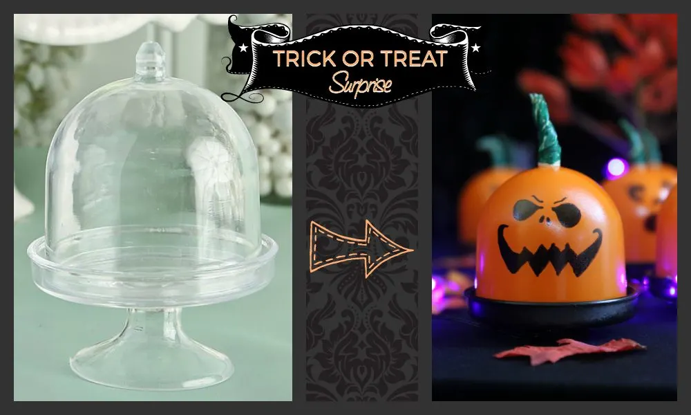 Clear mini cake stand next to one decorated as a pumpkin. 
