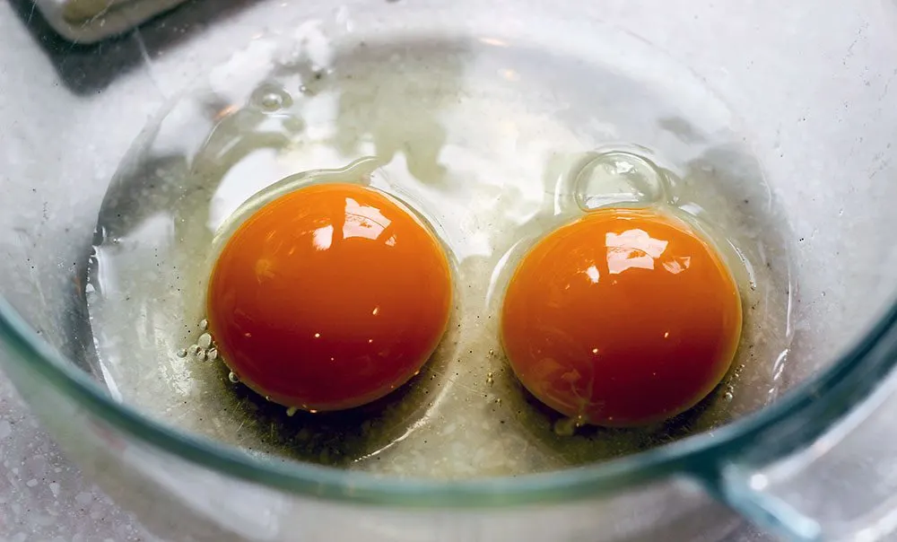 Farm fresh eggs have a deep orange yolk