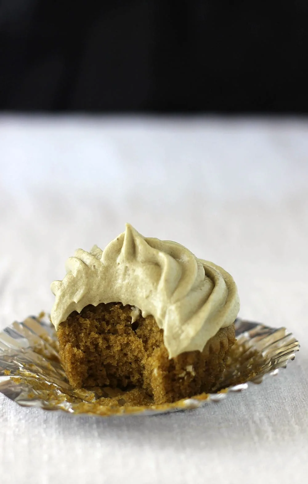 Green Tea Matcha Cupcake with a bite taken out