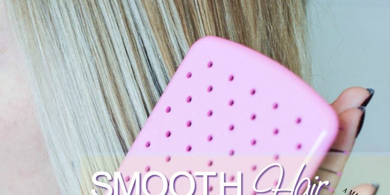 Spray your brush to evenly distribute hairspray and smooth out hair