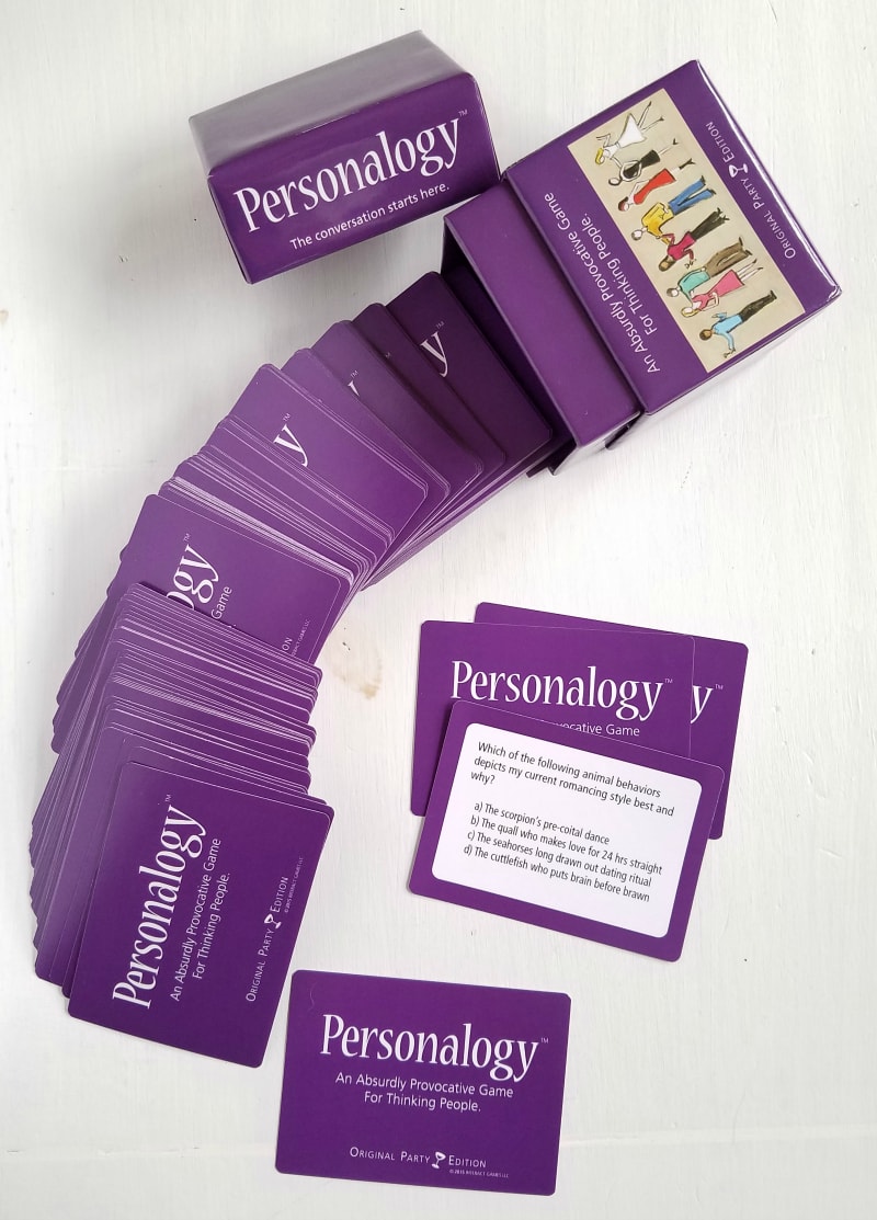 Personalogy cards spread across a table. 