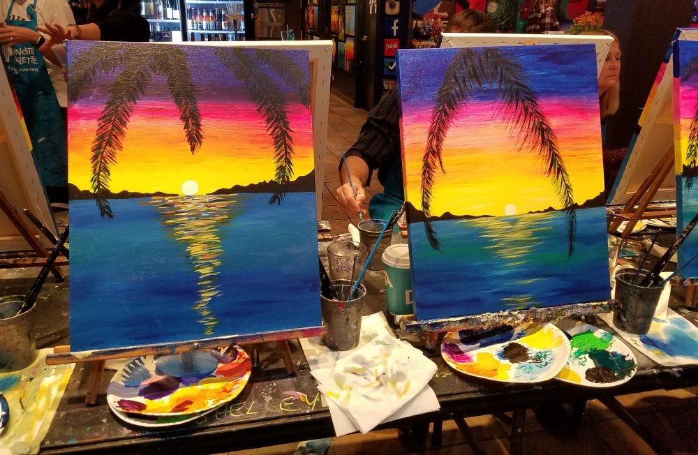 Ocean sunset paintings at Pinot's Pallette. 